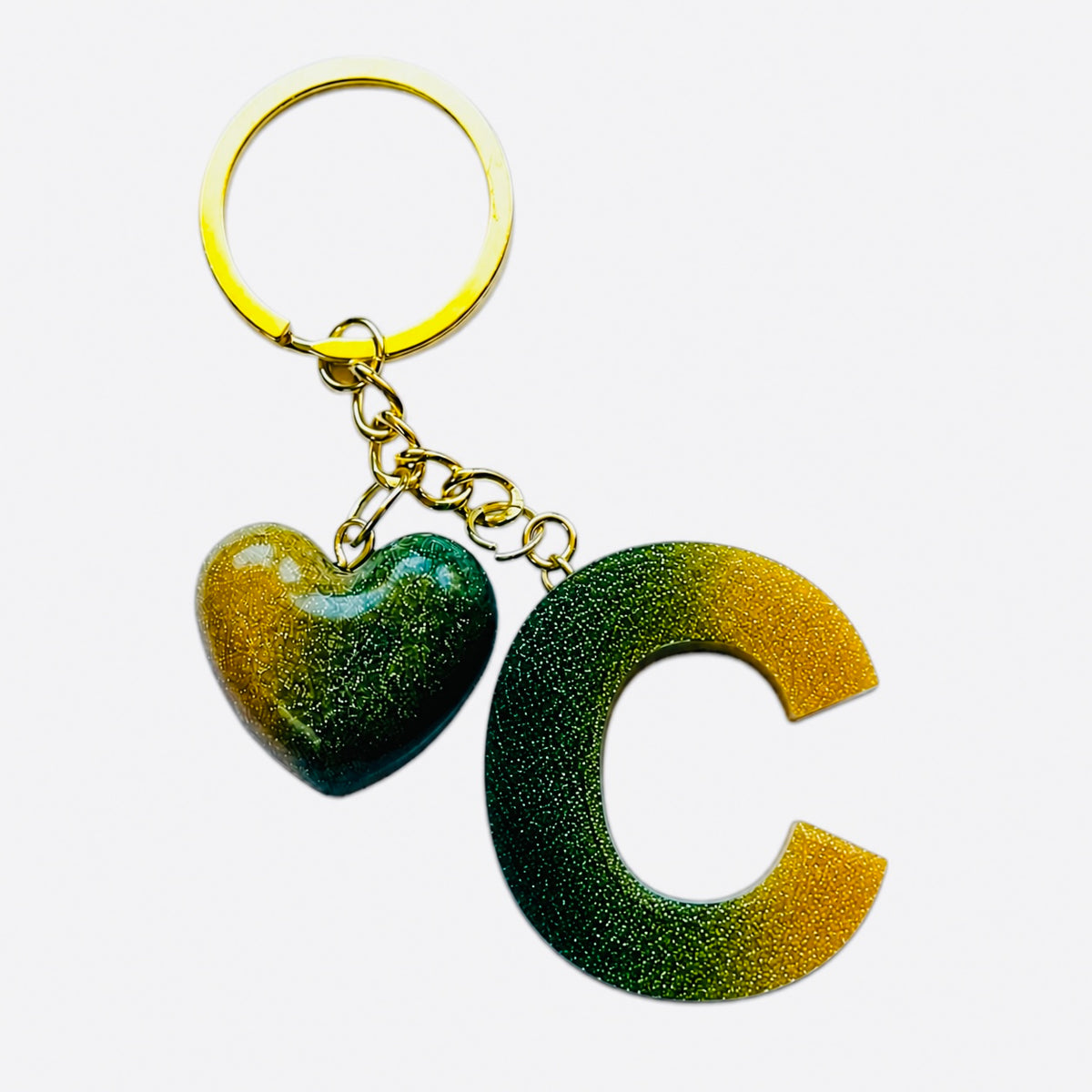 handmade green letter keychain with gold heart charm, product view 3