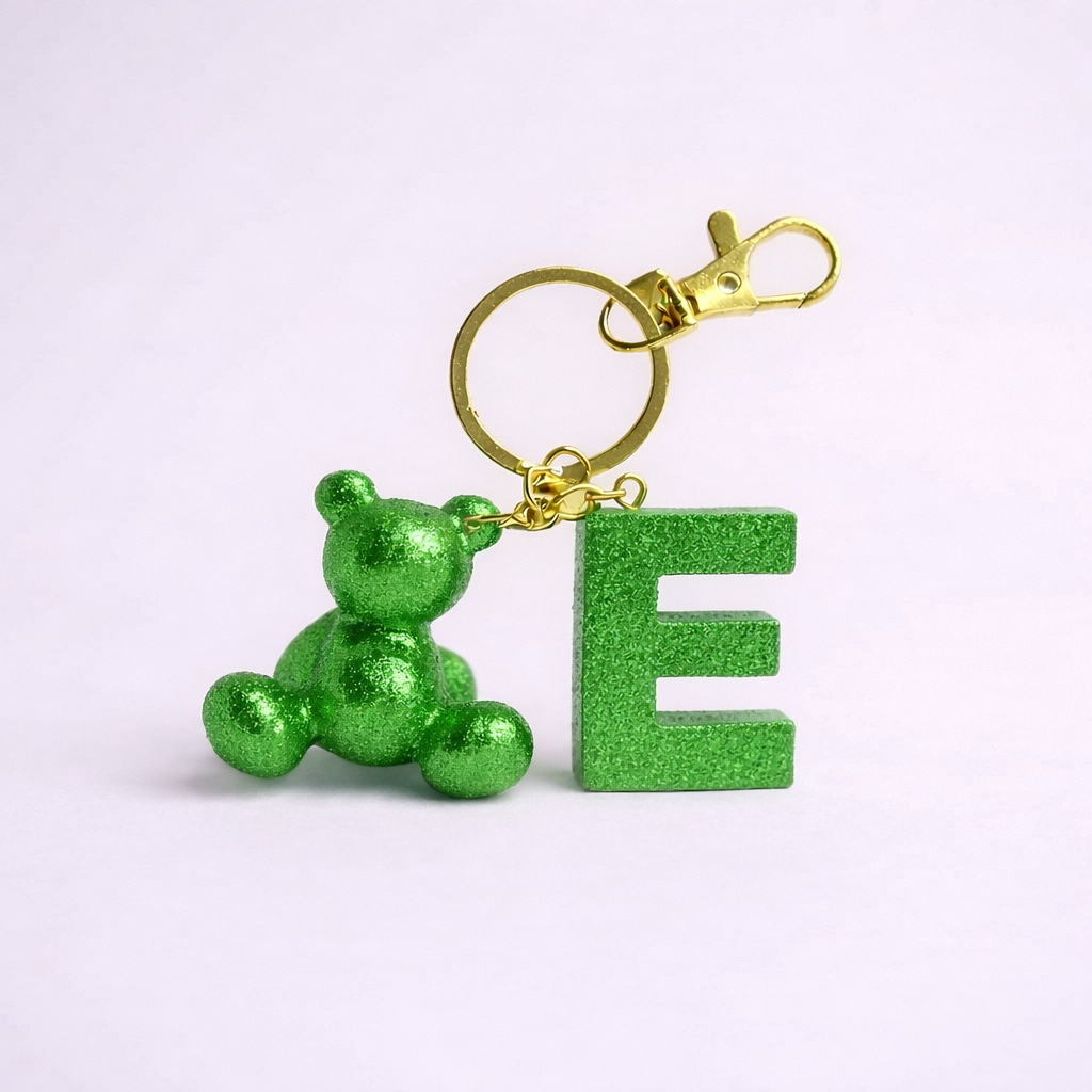 Green handmade resin bear keychain with the letter E