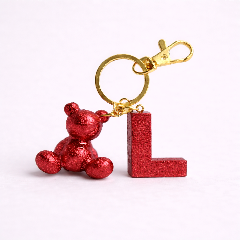 Red handmade resin bear keychain with the letter L