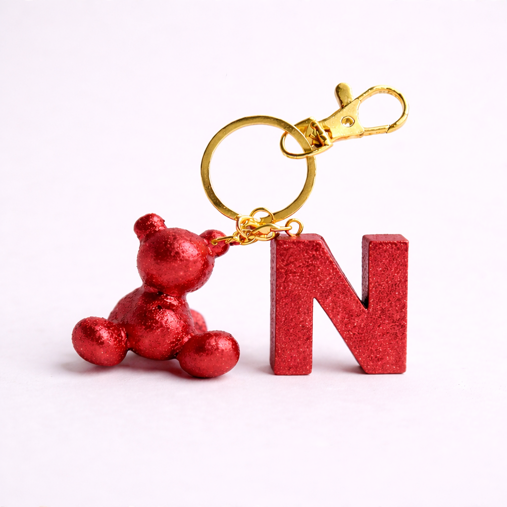 Red handmade resin bear keychain with the letter N