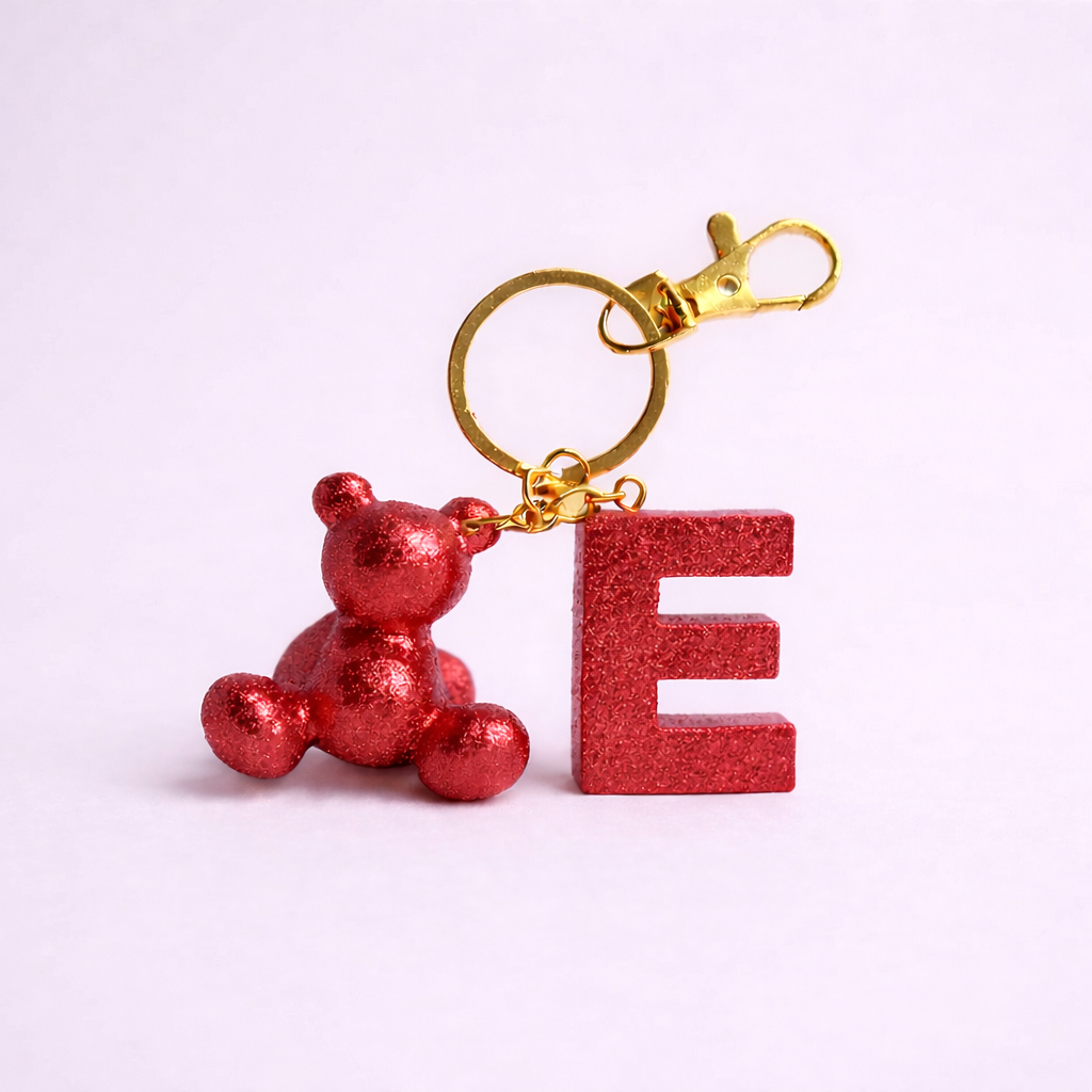 Red handmade resin bear keychain with the letter E