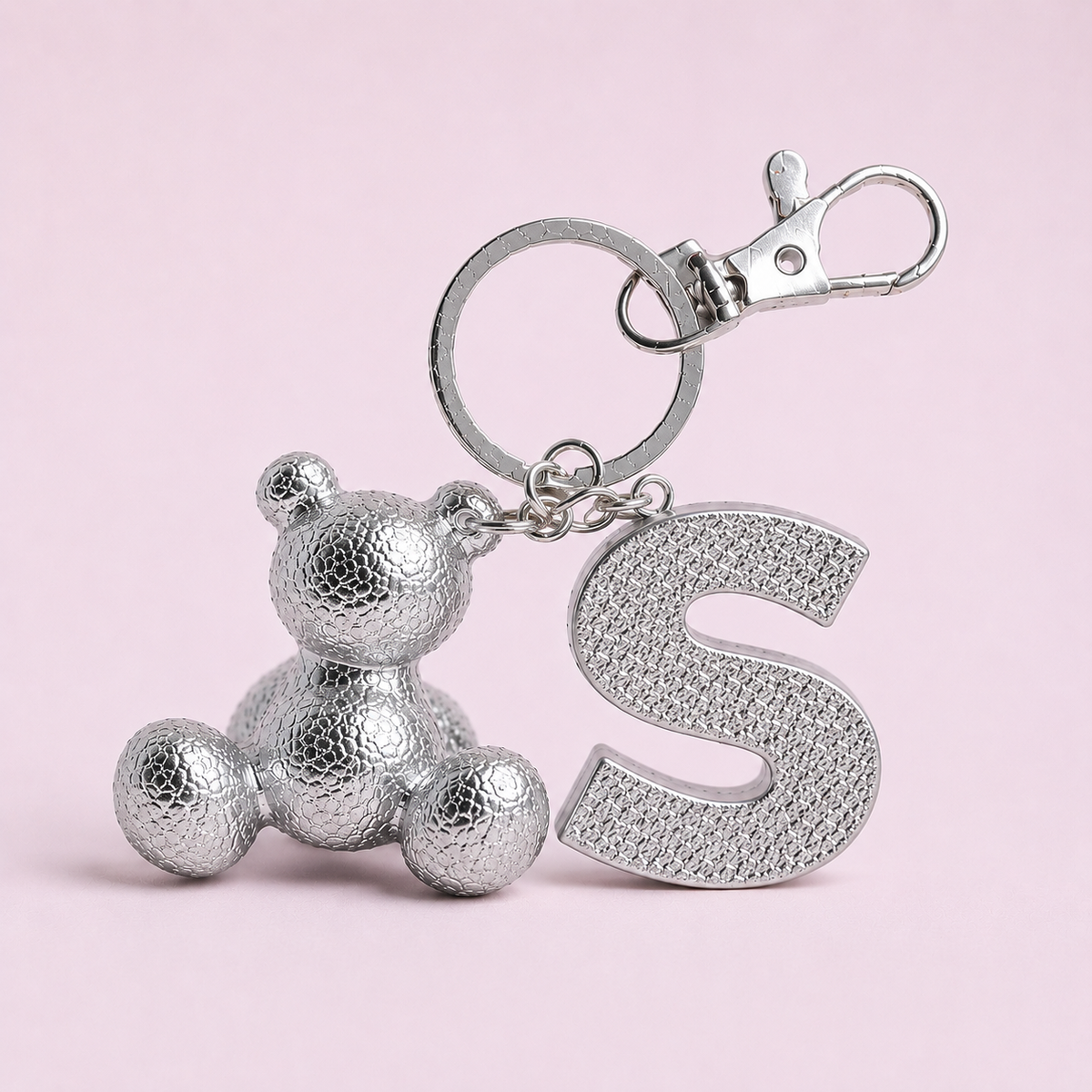 Silver handmade resin bear keychain with the letter S