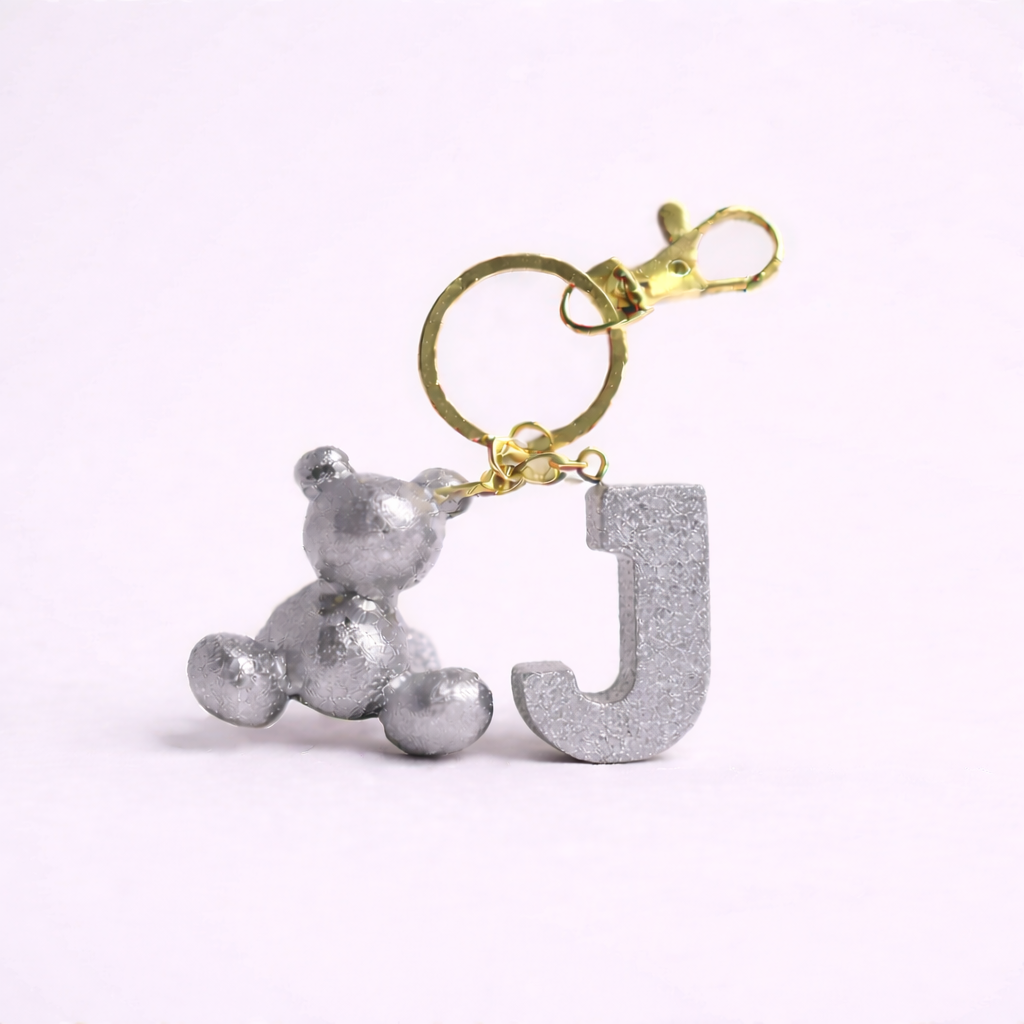 Silver handmade resin bear keychain with the letter J