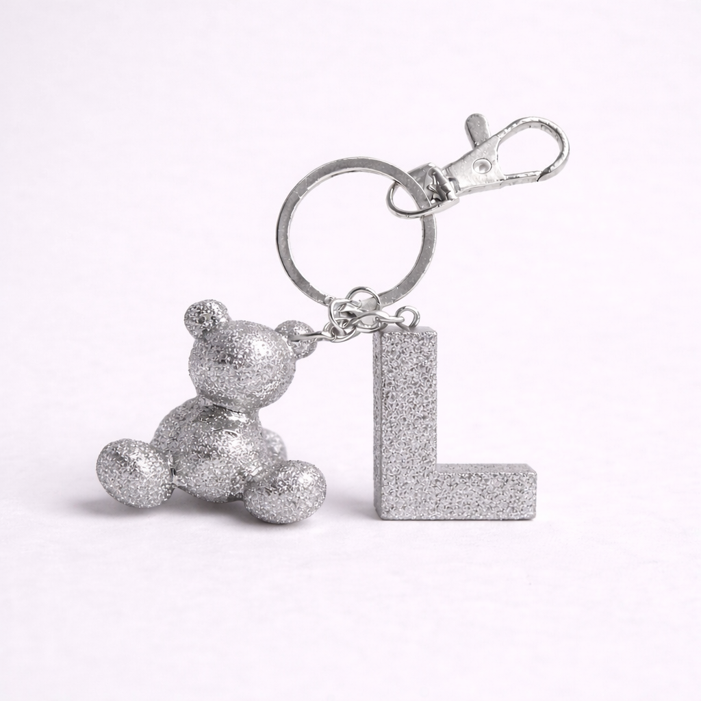 Silver handmade resin bear keychain with the letter L