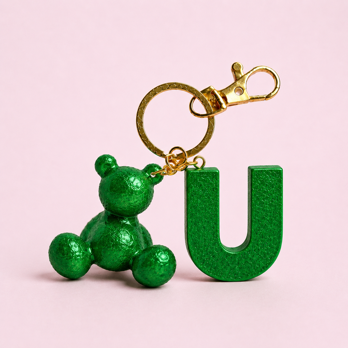 Green handmade resin bear keychain with the letter U