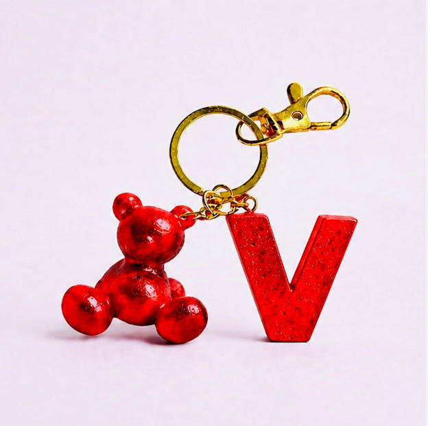 Red handmade resin bear keychain with the letter V