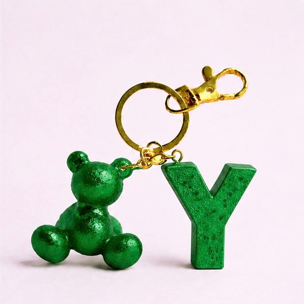 Green handmade resin bear keychain with the letter Y
