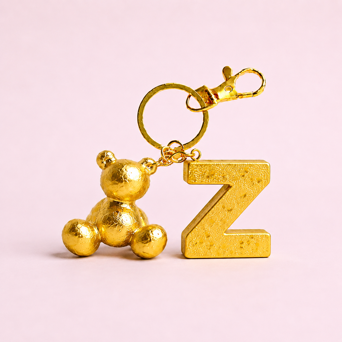 Gold handmade resin bear keychain with the letter Z