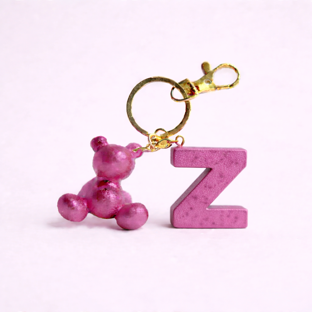 Pink handmade resin bear keychain with the letter Z