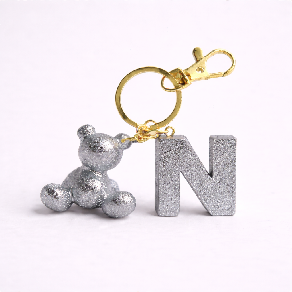 Silver handmade resin bear keychain with the letter N
